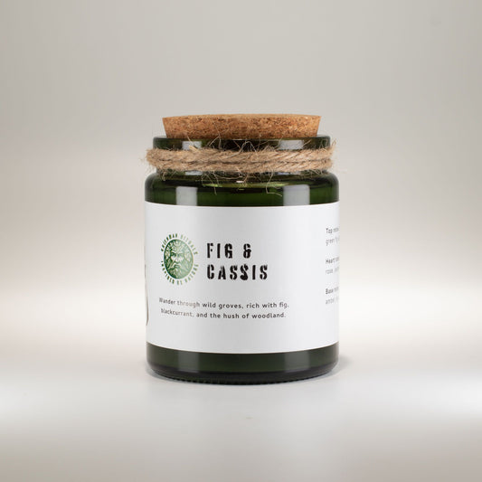 Detailed close up view highlighting the high quality craftsmanship and individual features of the greenman woodwick soy candle fig cassis407