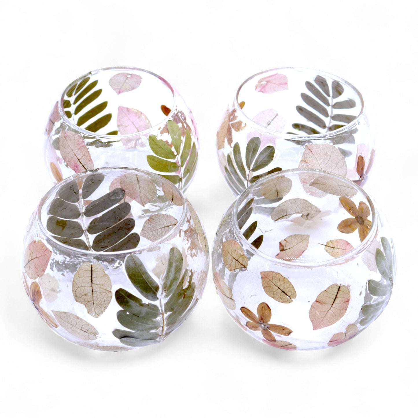 Detailed close up view highlighting the high quality craftsmanship and individual features of the natural floral glass bowl candle holder primavera 8x10cm620