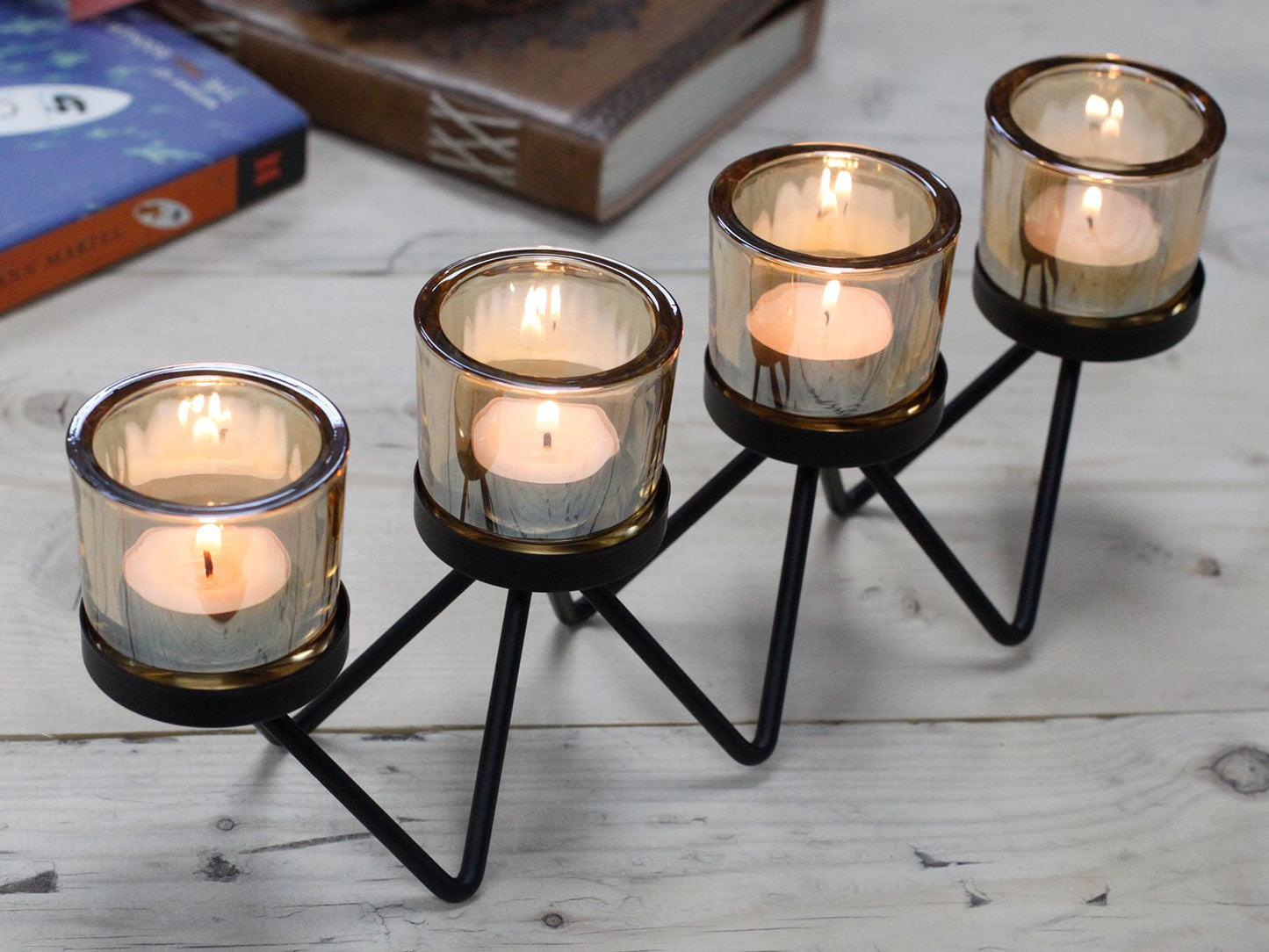 Detailed close up view highlighting the high quality craftsmanship and individual features of the centrepiece iron votive candle holder 4 cup zig zag428