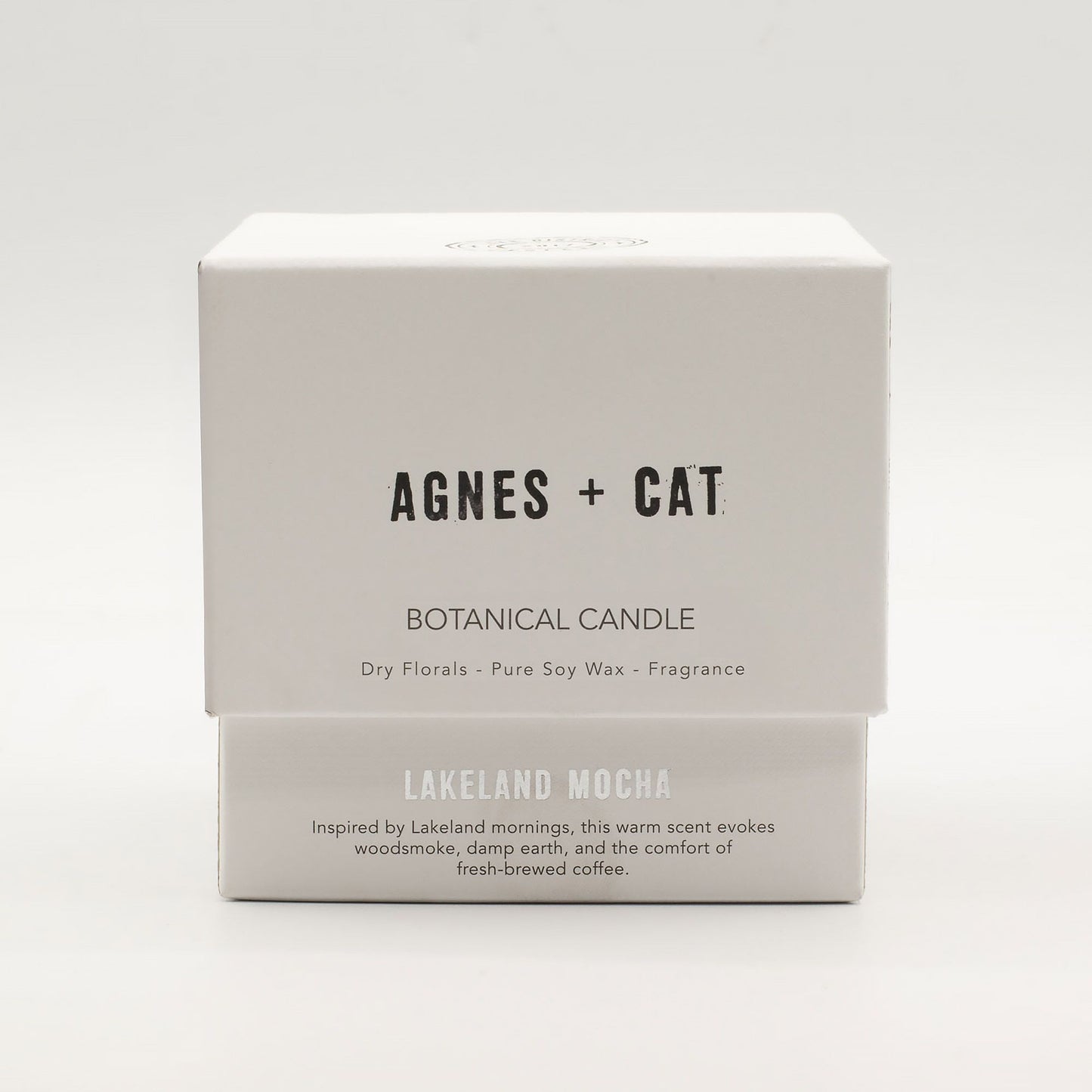 Detailed close up view highlighting the high quality craftsmanship and individual features of the agnes cat botanical soy wax candle lakeland mocha571