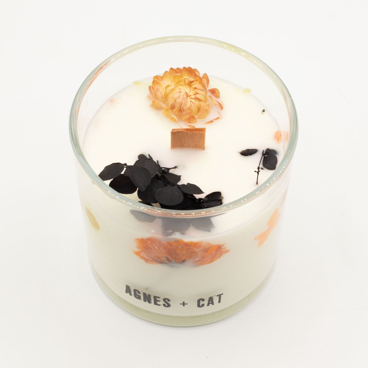 Detailed close up view highlighting the high quality craftsmanship and individual features of the agnes cat botanical soy wax candle lakeland mocha571