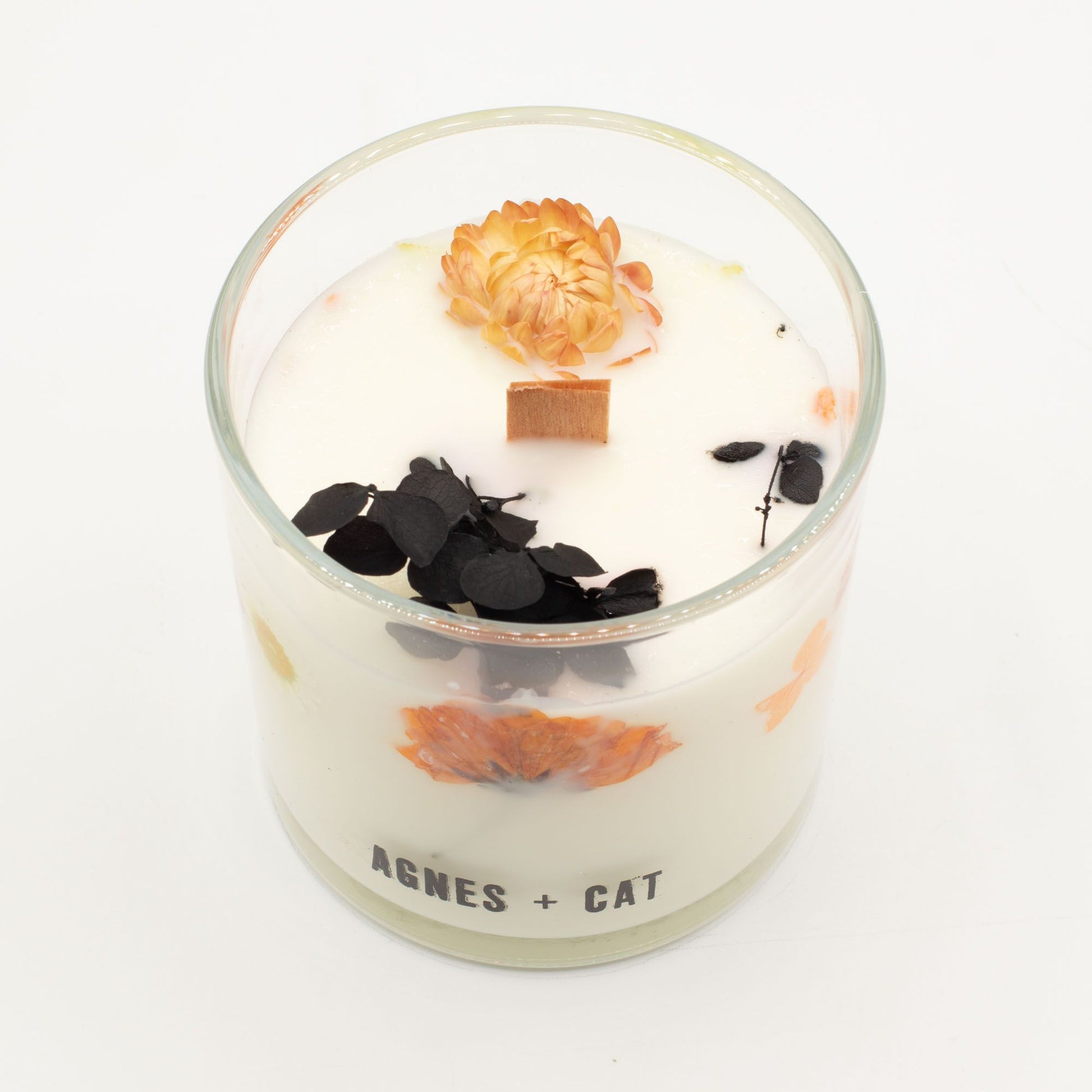 Detailed close up view highlighting the high quality craftsmanship and individual features of the agnes cat botanical soy wax candle lakeland mocha571