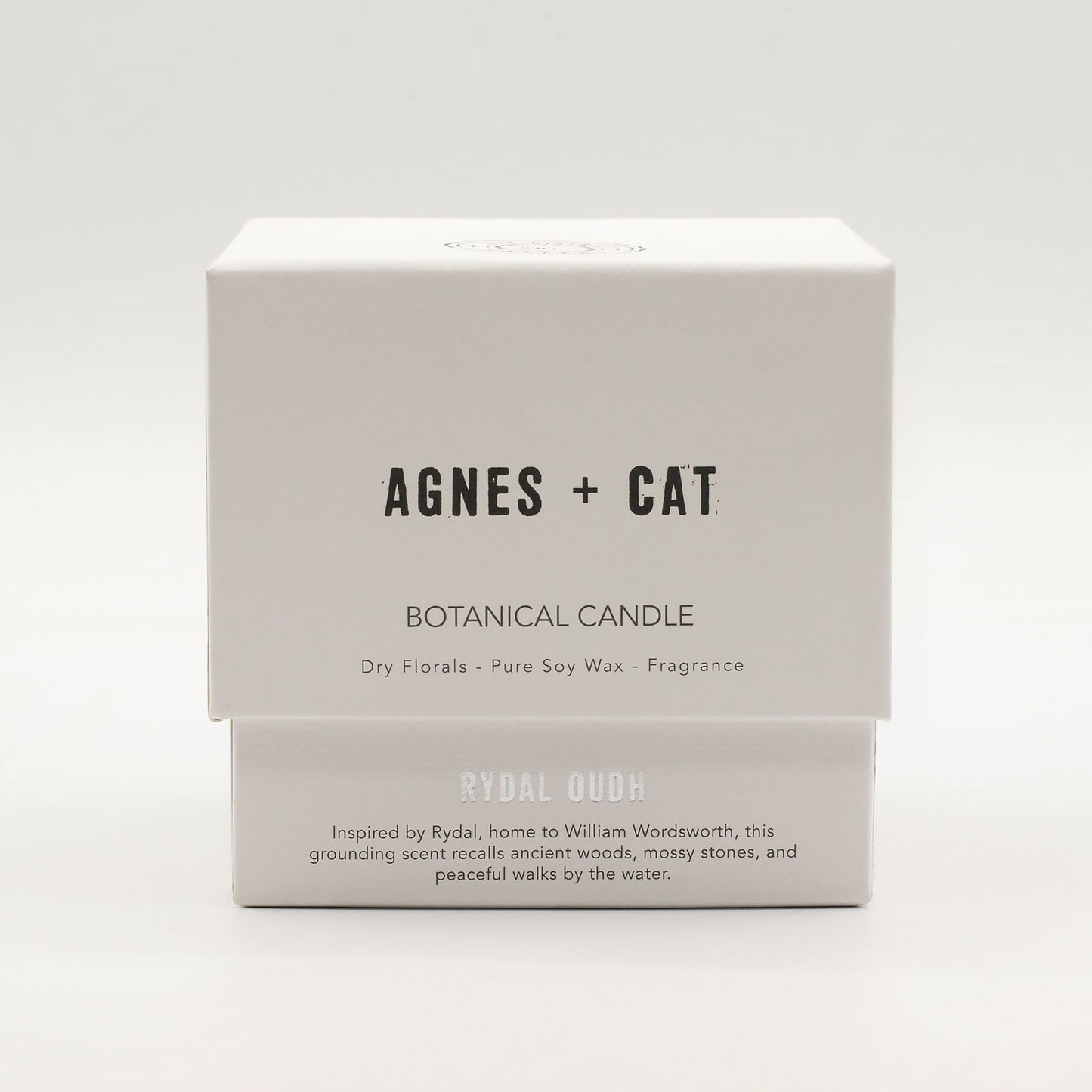 Detailed close up view highlighting the high quality craftsmanship and individual features of the agnes cat botanical soy wax candle rydal oudh575