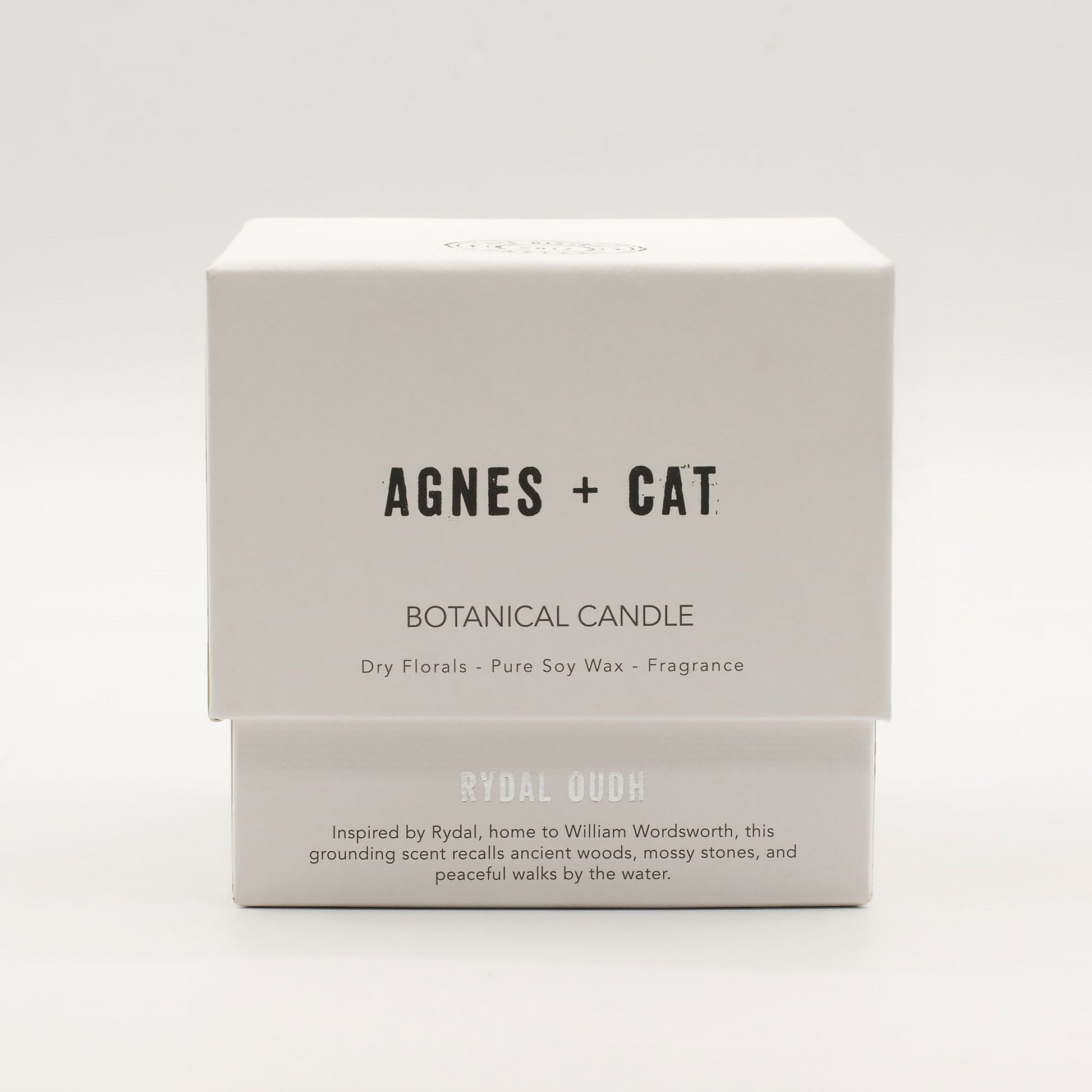 Detailed close up view highlighting the high quality craftsmanship and individual features of the agnes cat botanical soy wax candle rydal oudh575