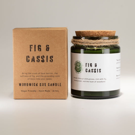 Luxury presentation of the greenman woodwick soy candle fig cassis407 showing the premium artisan packaging and complete set contents