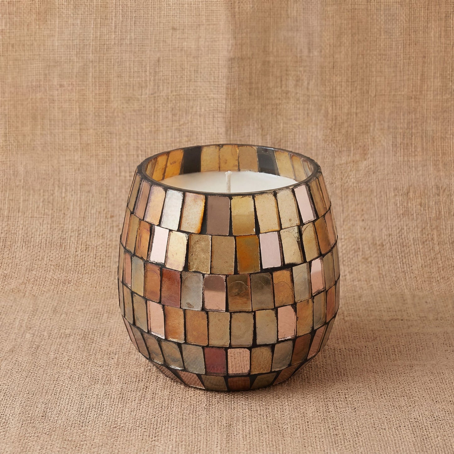 Detailed close up view highlighting the high quality craftsmanship and individual features of the small glass jar candles amber mosaic425