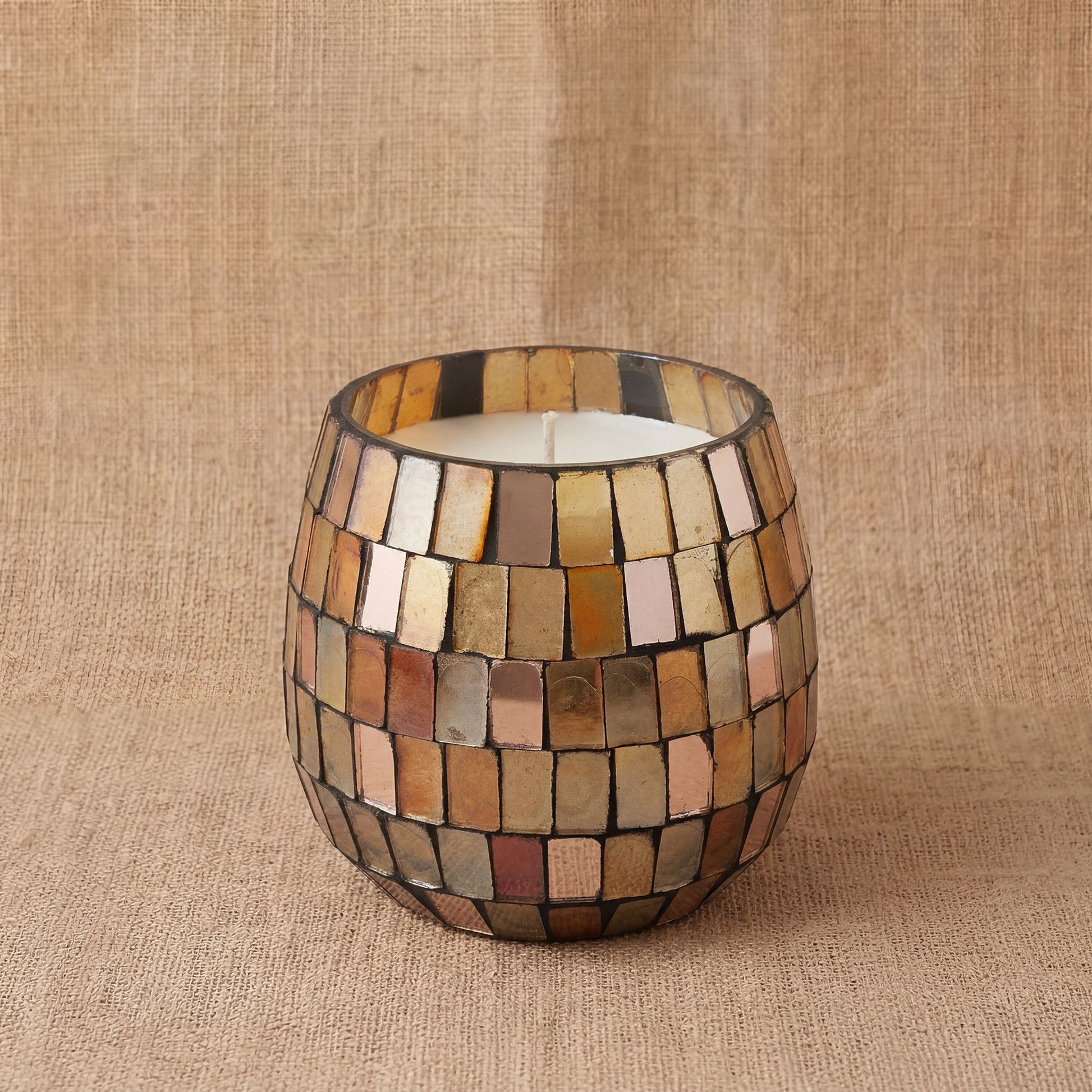 Detailed close up view highlighting the high quality craftsmanship and individual features of the small glass jar candles amber mosaic425