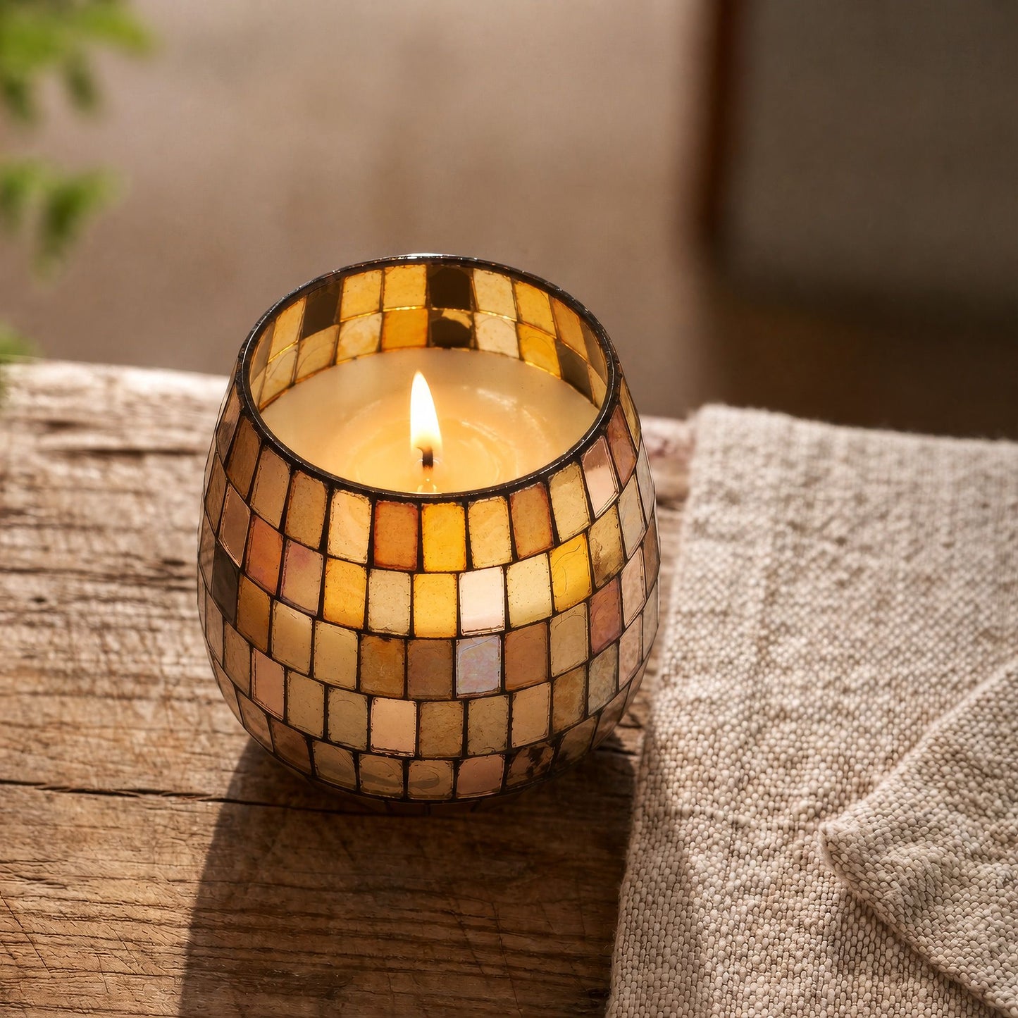 Detailed close up view highlighting the high quality craftsmanship and individual features of the small glass jar candles amber mosaic425