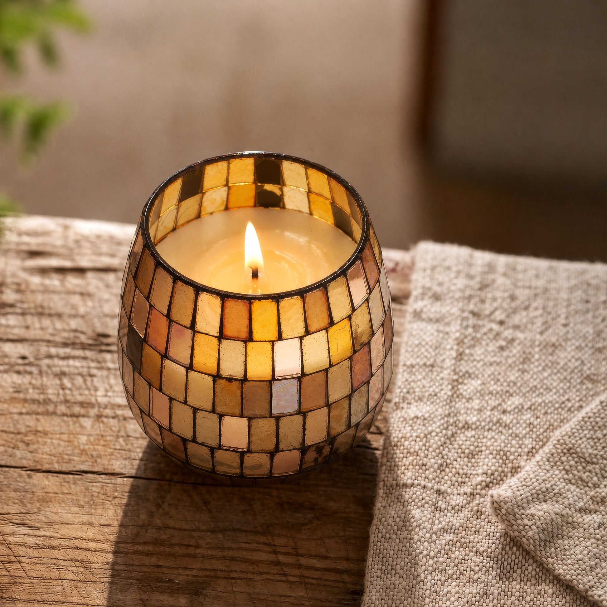 Detailed close up view highlighting the high quality craftsmanship and individual features of the small glass jar candles amber mosaic425