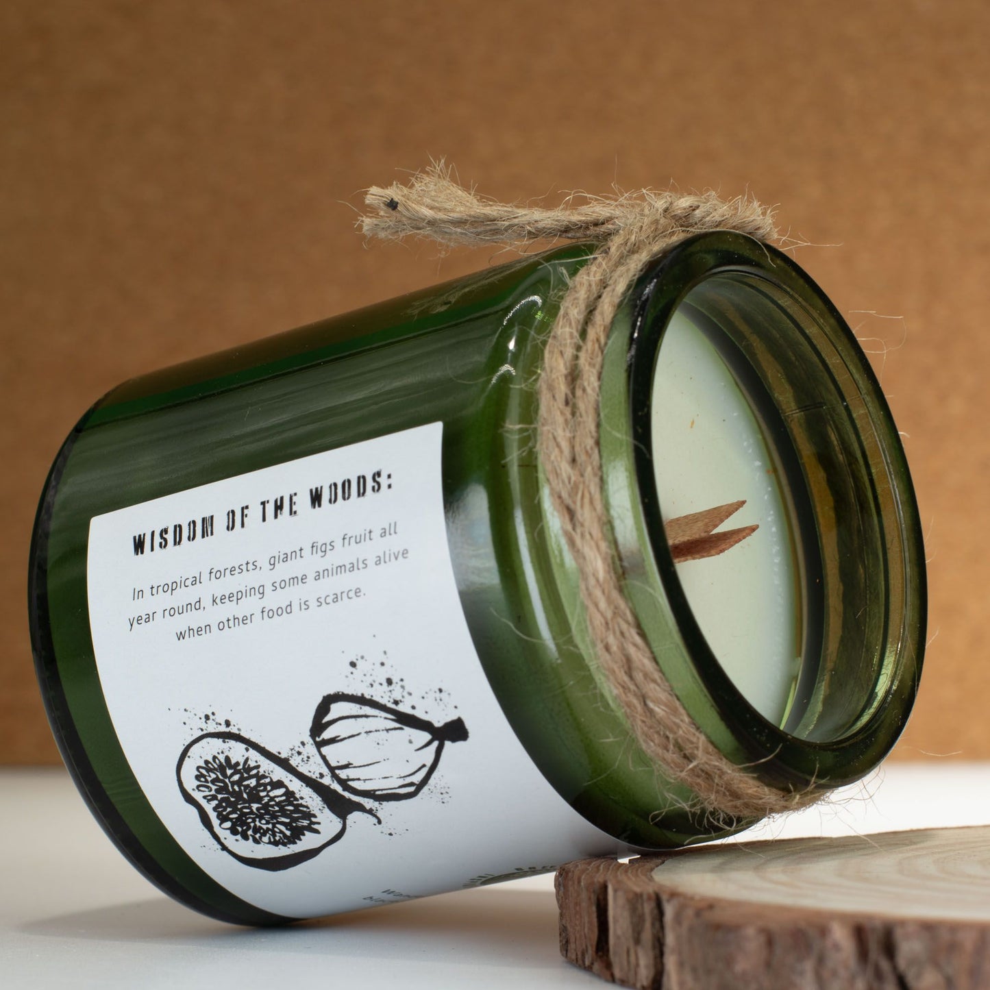 Detailed close up view highlighting the high quality craftsmanship and individual features of the greenman woodwick soy candle fig cassis407