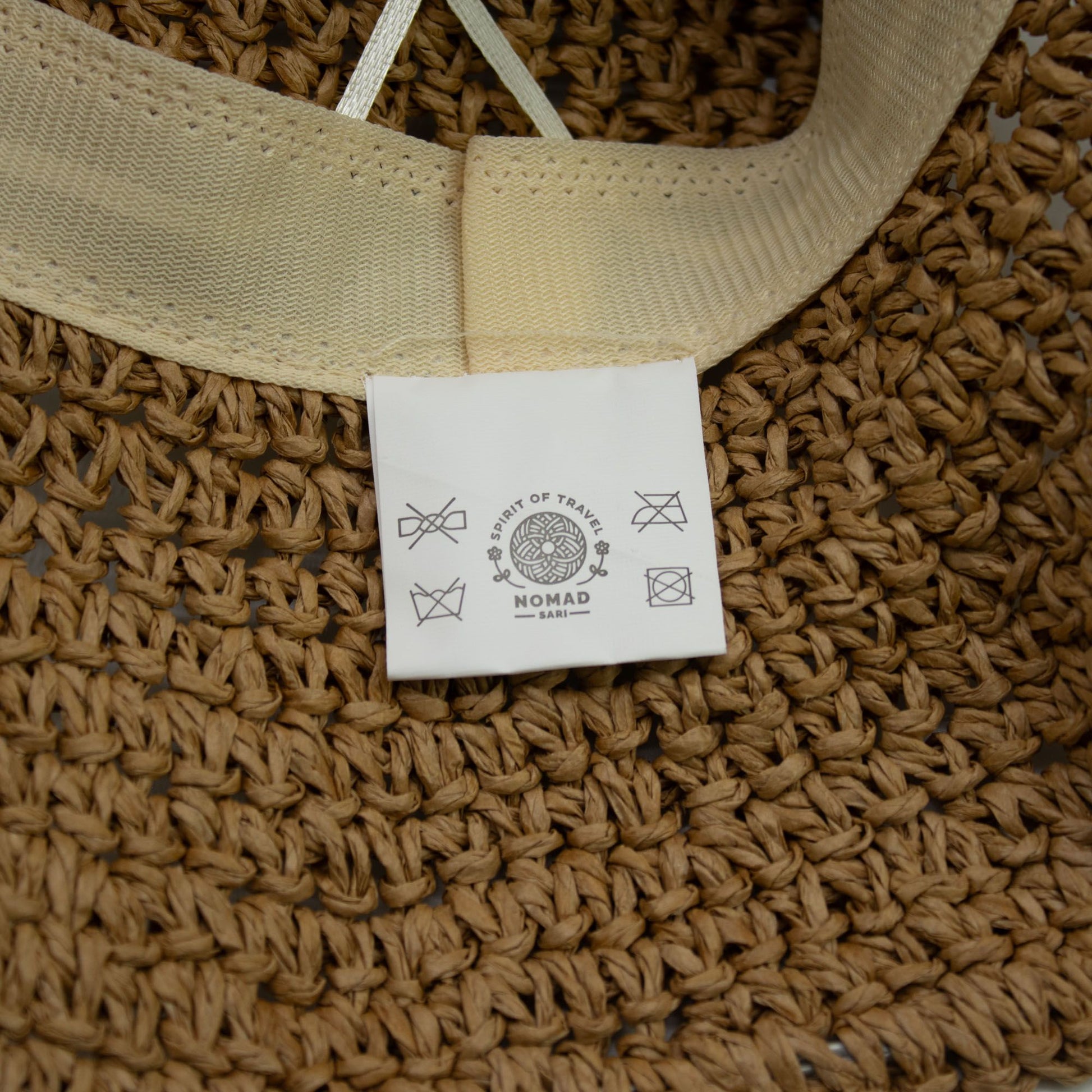 Photo 5 of Nomad Sari Floppy Straw Sun Hat - Coffee & Daisies featuring authentic premium craftsmanship.