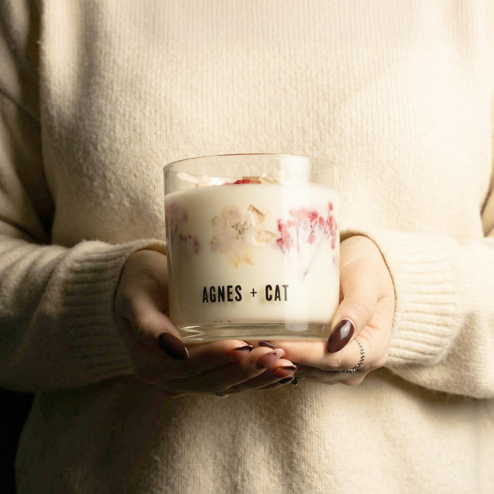 Detailed close up view highlighting the high quality craftsmanship and individual features of the agnes cat botanical soy wax candle lakeland mocha571