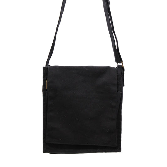 Cotton Canvas Messenger Bag - Black lifestyle product photo on neutral background
