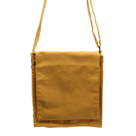 Cotton Canvas Messenger Bag - Yellow lifestyle product photo on neutral background