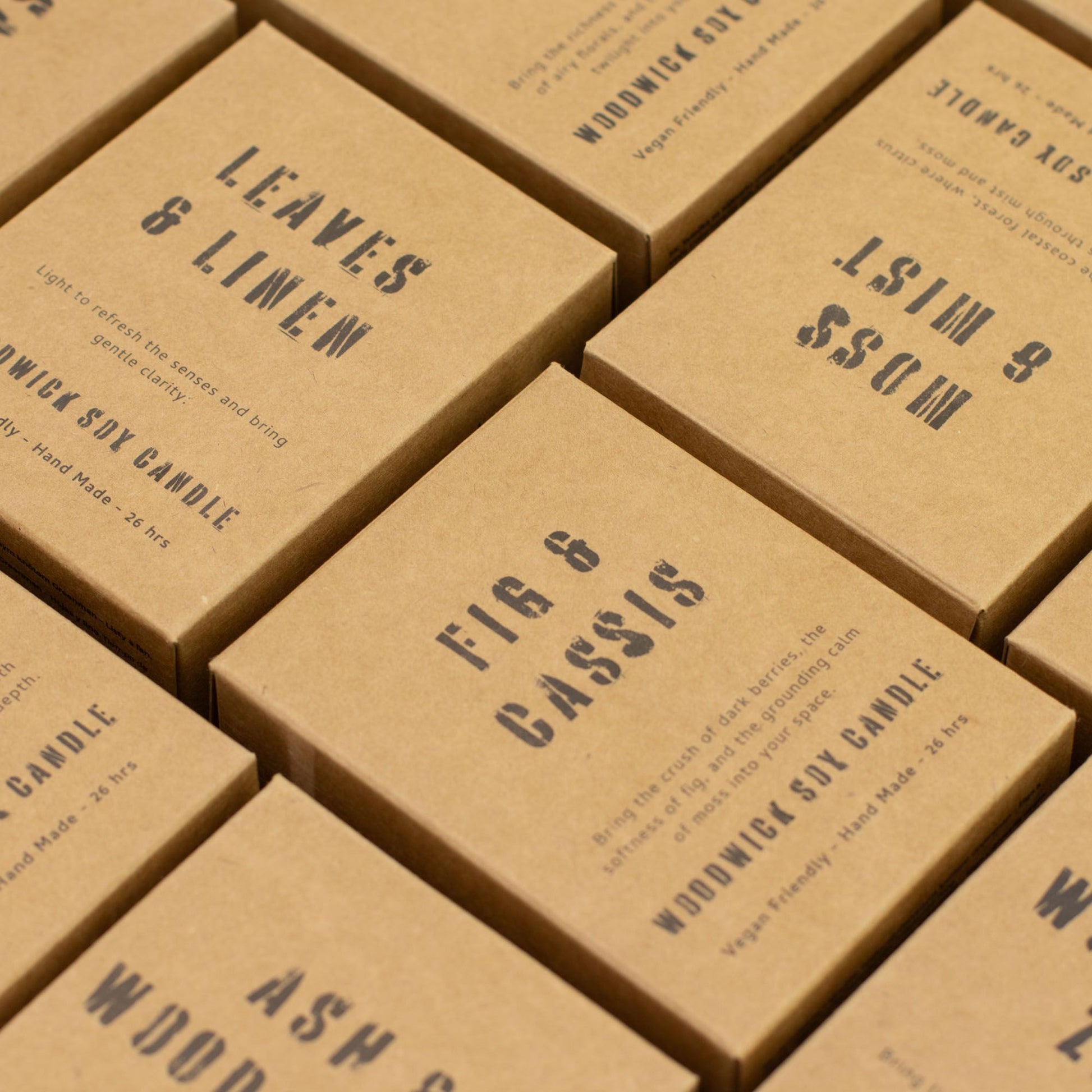 Detailed close up view highlighting the high quality craftsmanship and individual features of the greenman woodwick soy candle fig cassis407
