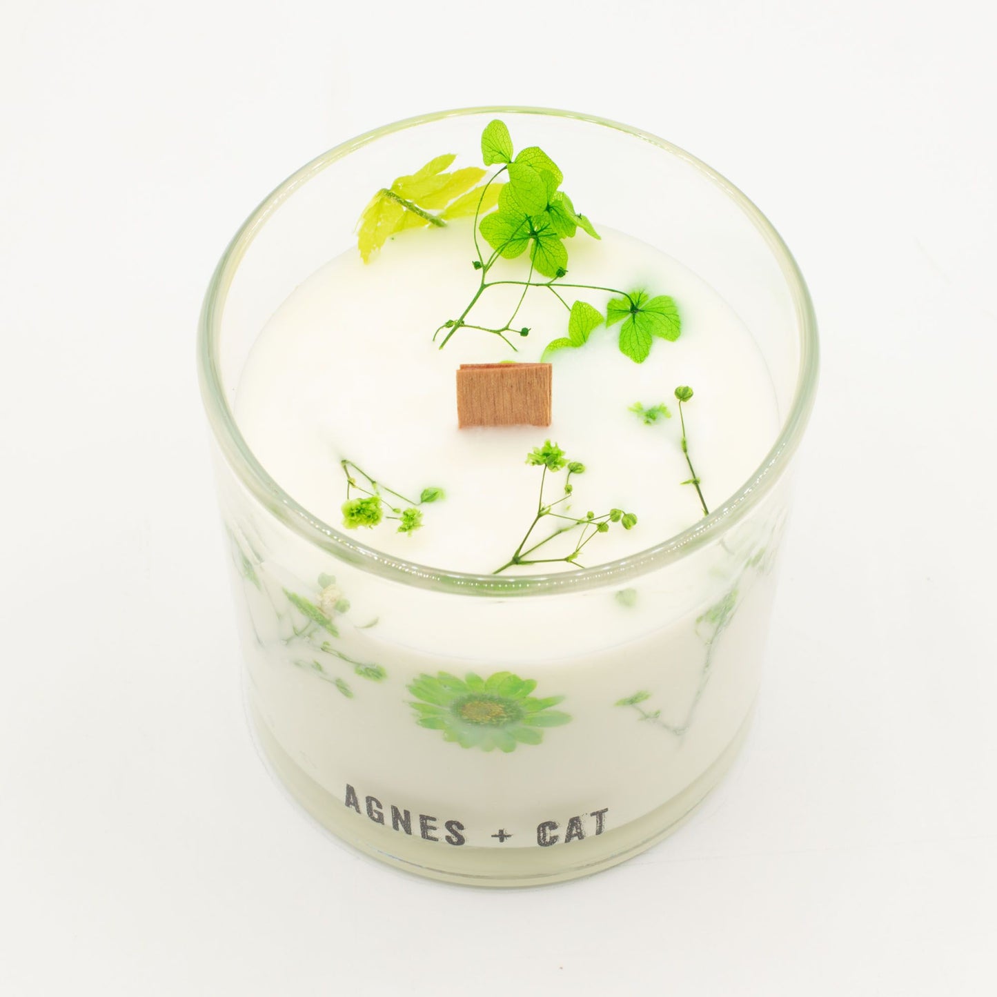 Detailed close up view highlighting the high quality craftsmanship and individual features of the agnes cat botanical soy wax candle fellberry578
