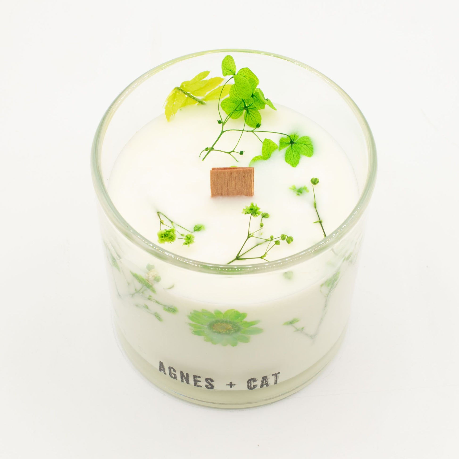 Detailed close up view highlighting the high quality craftsmanship and individual features of the agnes cat botanical soy wax candle fellberry578