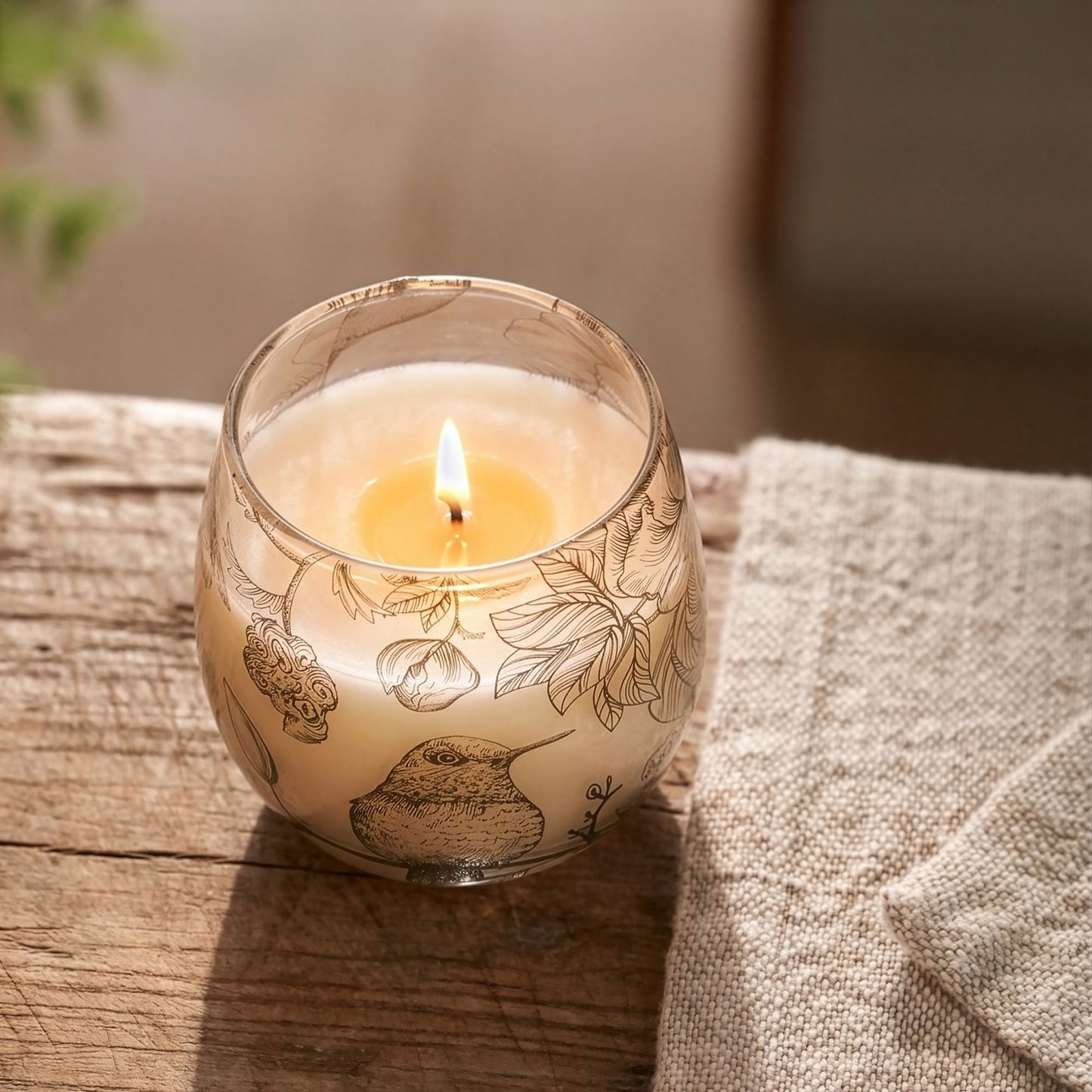 Detailed close up view highlighting the high quality craftsmanship and individual features of the small glass jar candles drawn by flame537