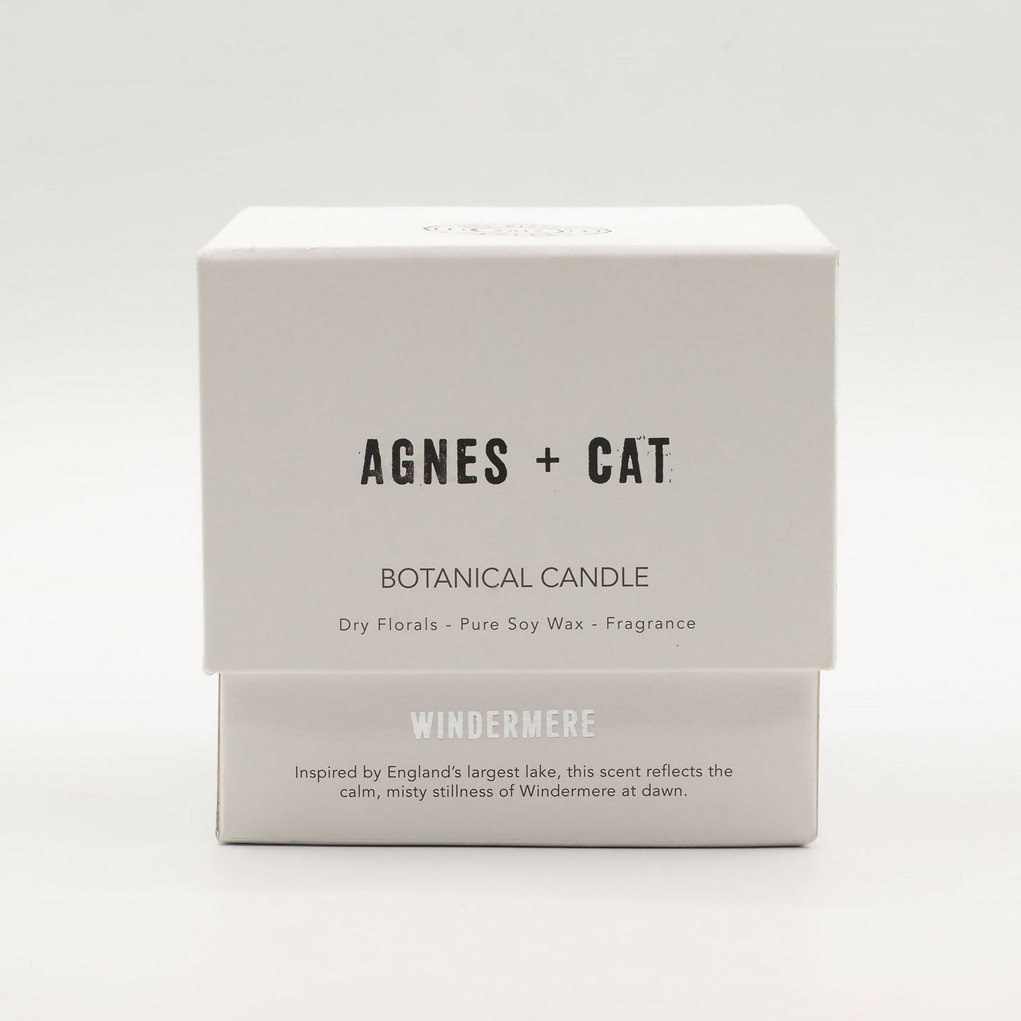 Detailed close up view highlighting the high quality craftsmanship and individual features of the agnes cat botanical soy wax candle windermere525