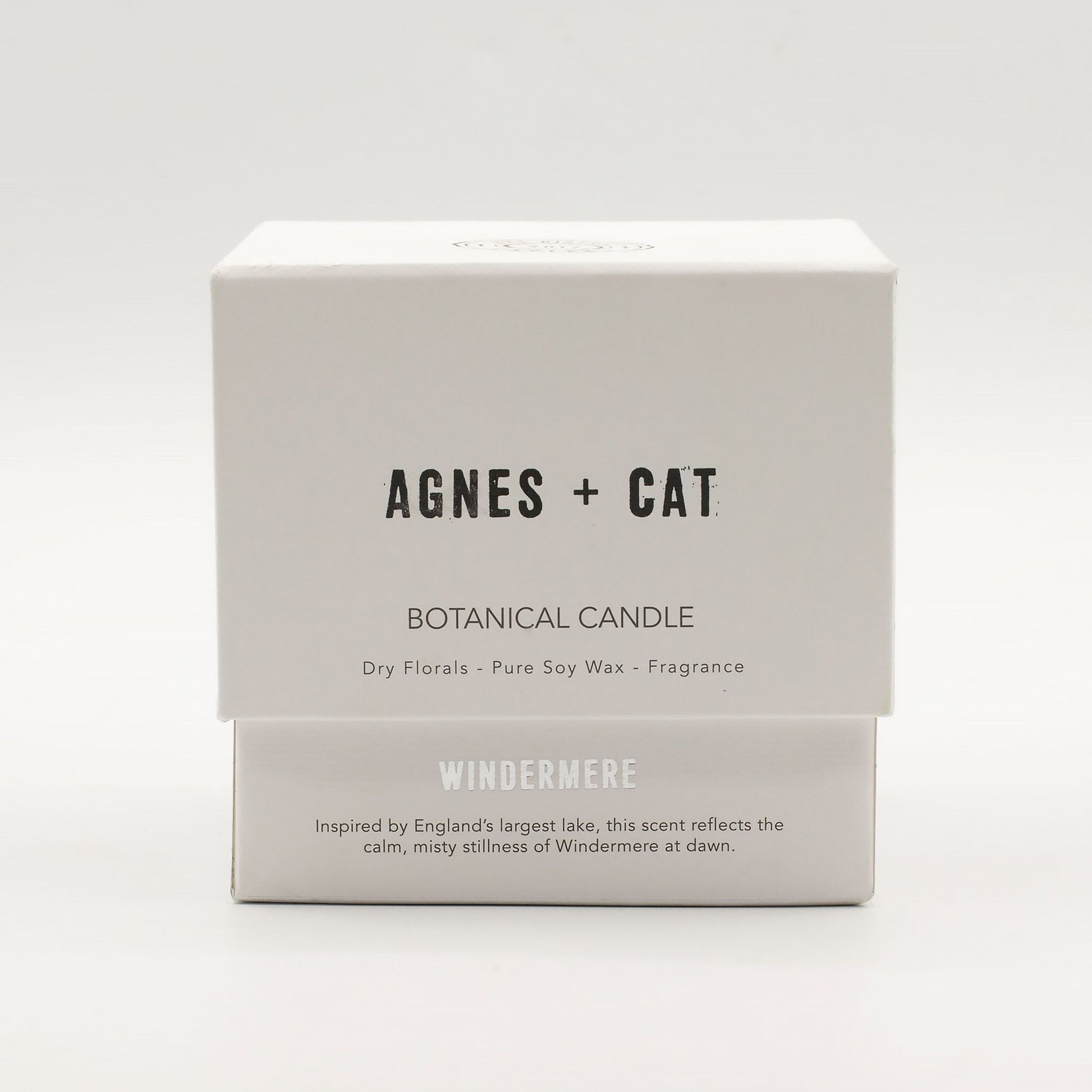Detailed close up view highlighting the high quality craftsmanship and individual features of the agnes cat botanical soy wax candle windermere525