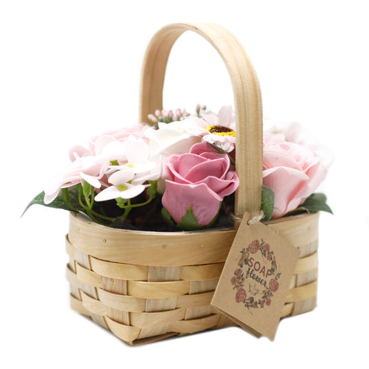 Luxury presentation of the medium pink bouquet in wicker basket846 showing the premium artisan packaging and complete set contents