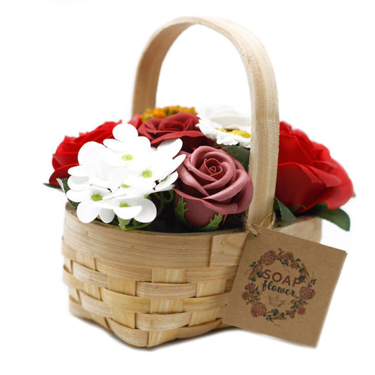 Luxury presentation of the medium red bouquet in wicker basket843 showing the premium artisan packaging and complete set contents