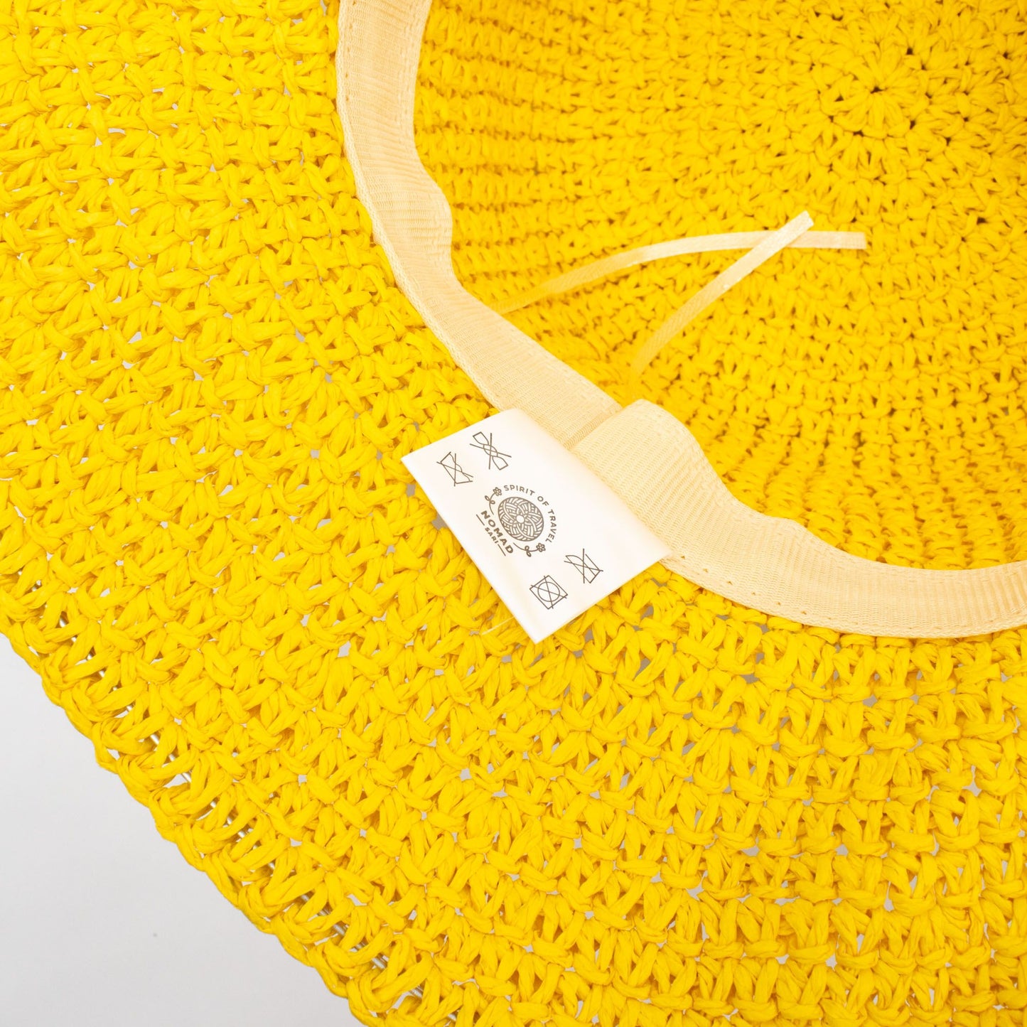 Photo 4 of Nomad Sari Floppy Straw Sun Hat - Yellow Sun Beach Hat featuring authentic premium craftsmanship.