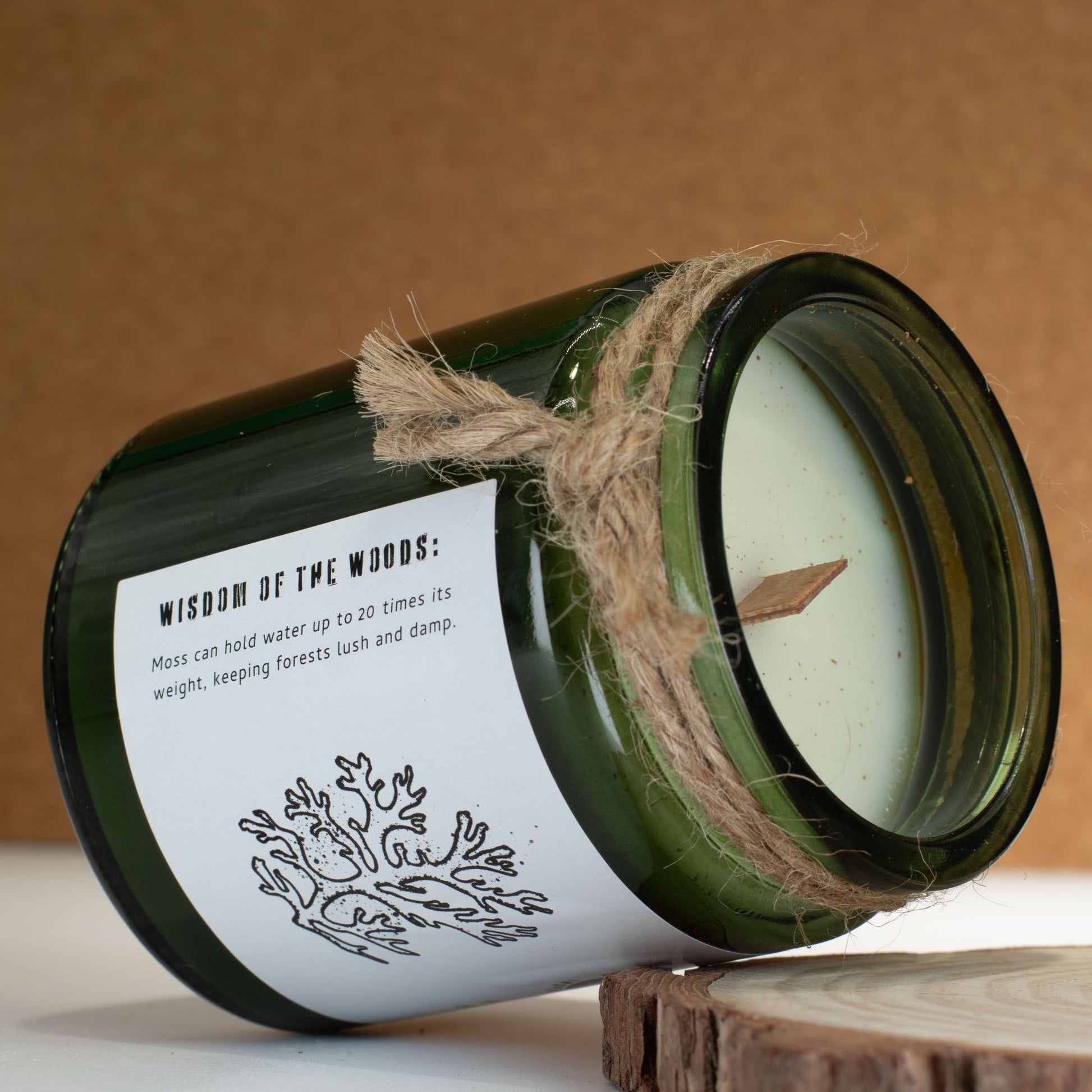 Detailed close up view highlighting the high quality craftsmanship and individual features of the greenman woodwick soy candle moss mist553