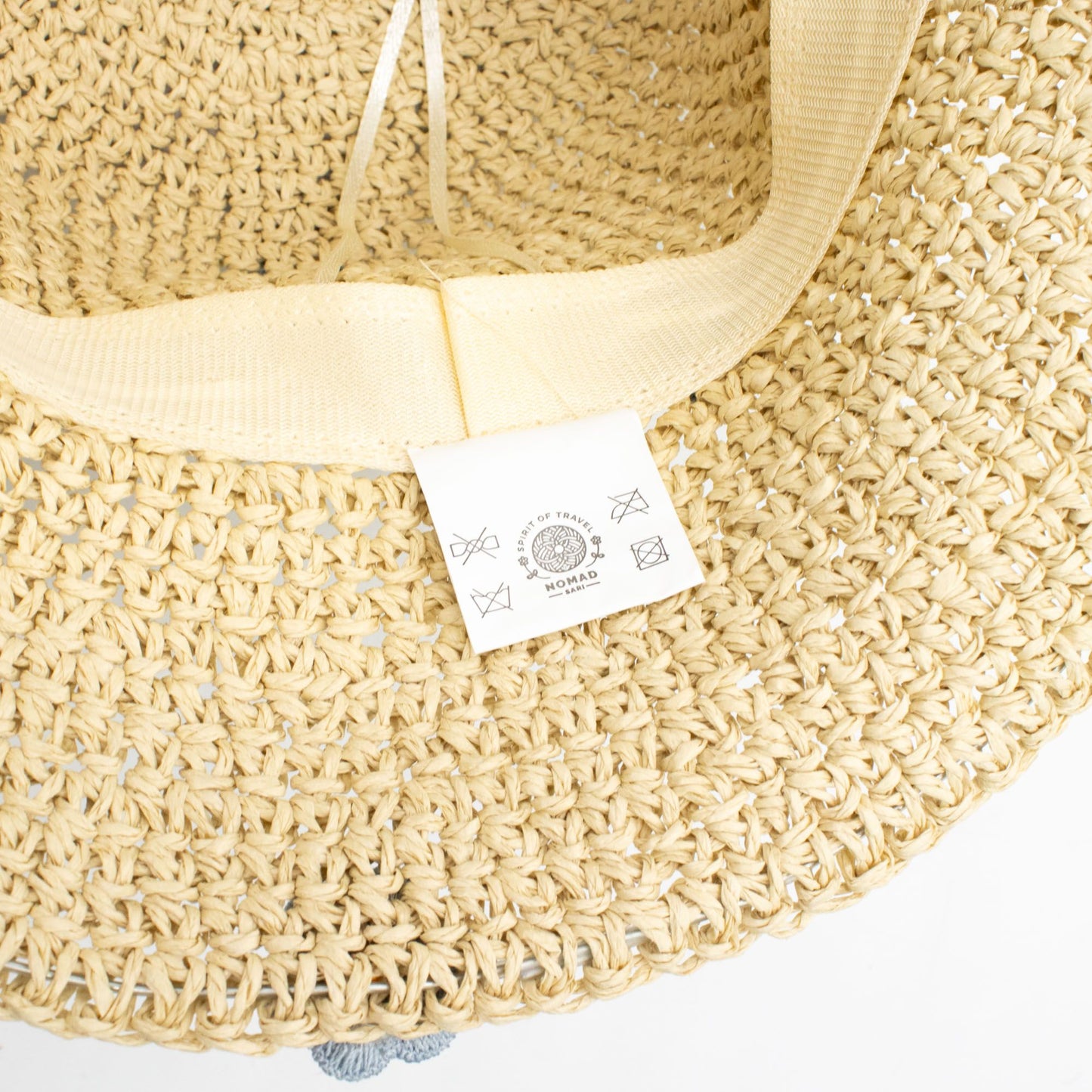 Photo 5 of Nomad Sari Floppy Straw Sun Hat - Beige & Blue Flowers featuring authentic premium craftsmanship.