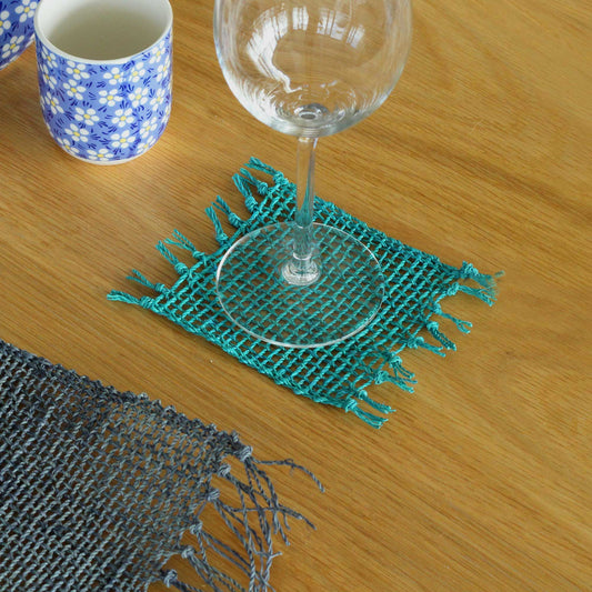 Set of 4 Seagrass Fringe Natural Coasters - Turquoise from our luxury java placemats and coasters collection
