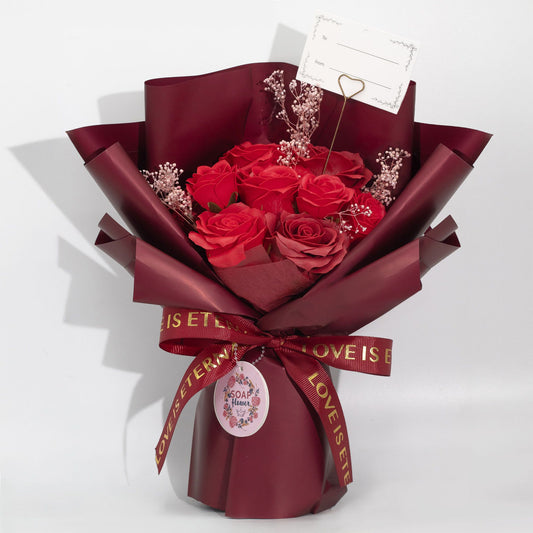 Luxury presentation of the large red roses bouquet love is eternal gift card826 showing the premium artisan packaging and complete set contents