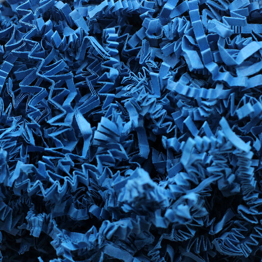 SizzlePak Shredded paper - Blue (1KG) lifestyle product photo on neutral background
