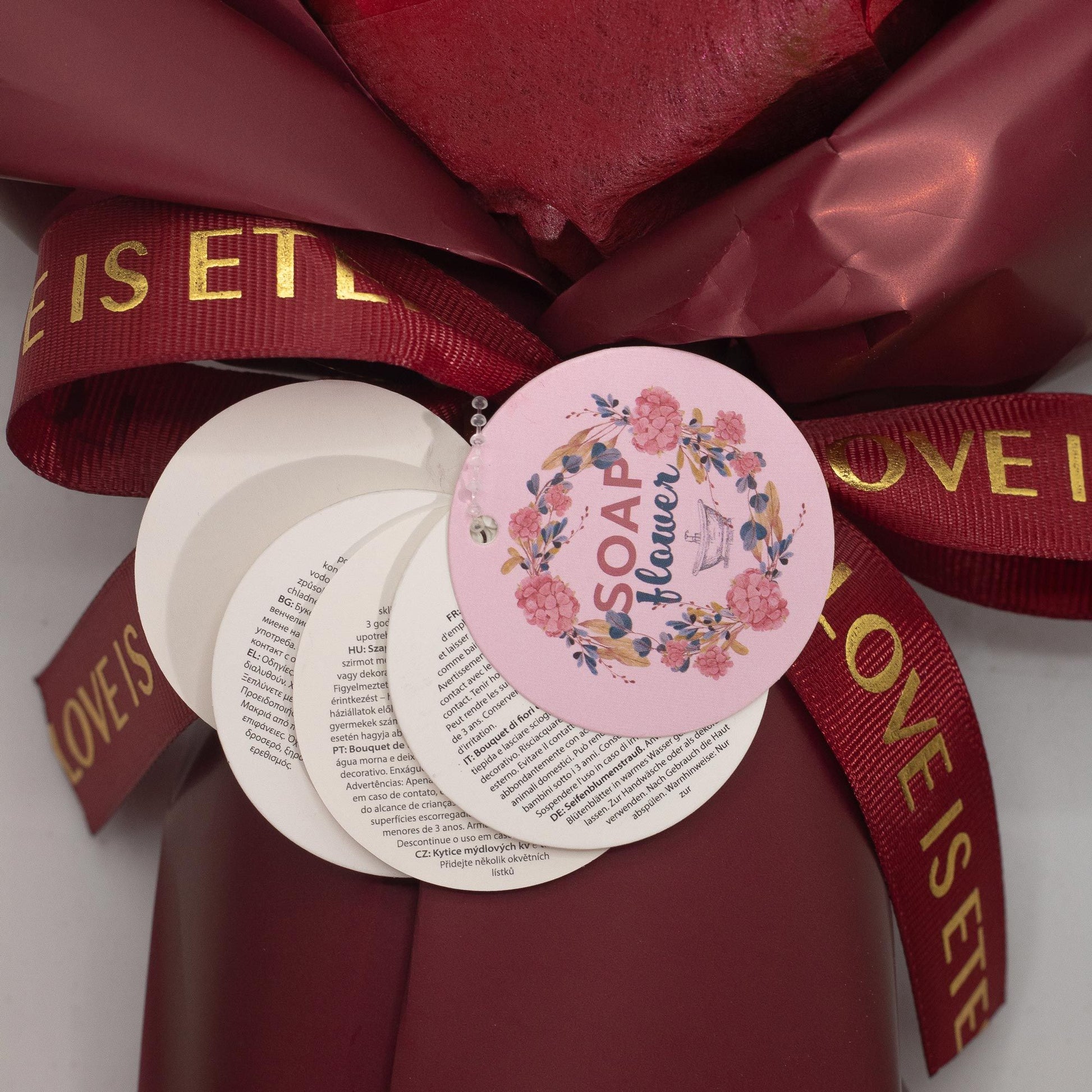 Detailed close up view highlighting the high quality craftsmanship and individual features of the large red roses bouquet love is eternal gift card826