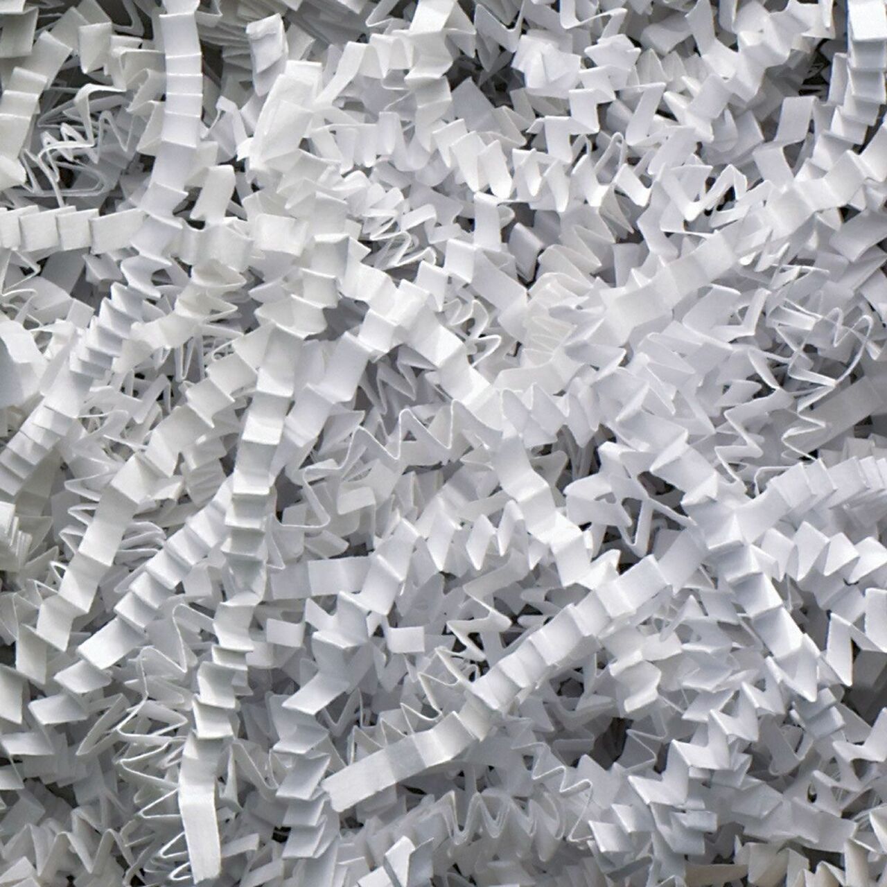 SizzlePak Shredded paper - White (1KG) lifestyle product photo on neutral background