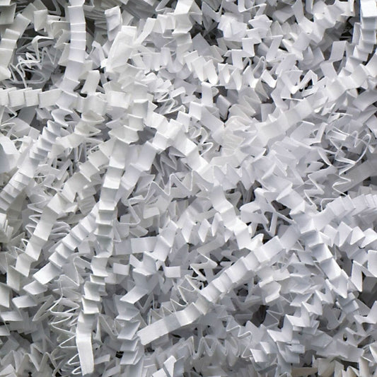 SizzlePak Shredded paper - White (1KG) lifestyle product photo on neutral background