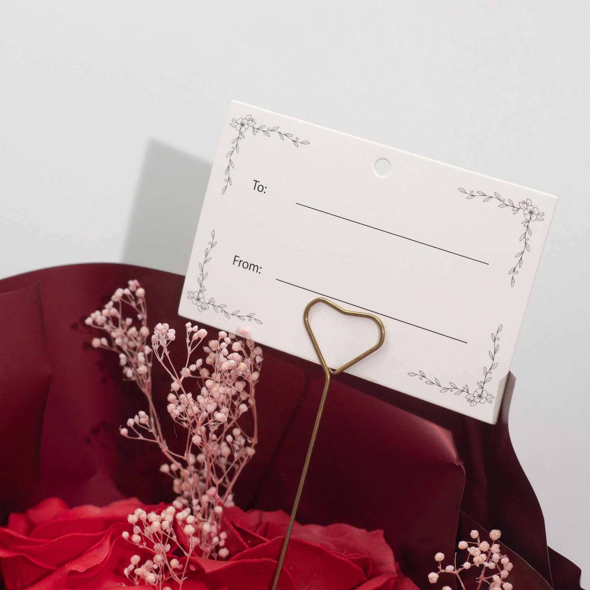 Detailed close up view highlighting the high quality craftsmanship and individual features of the large red roses bouquet love is eternal gift card826