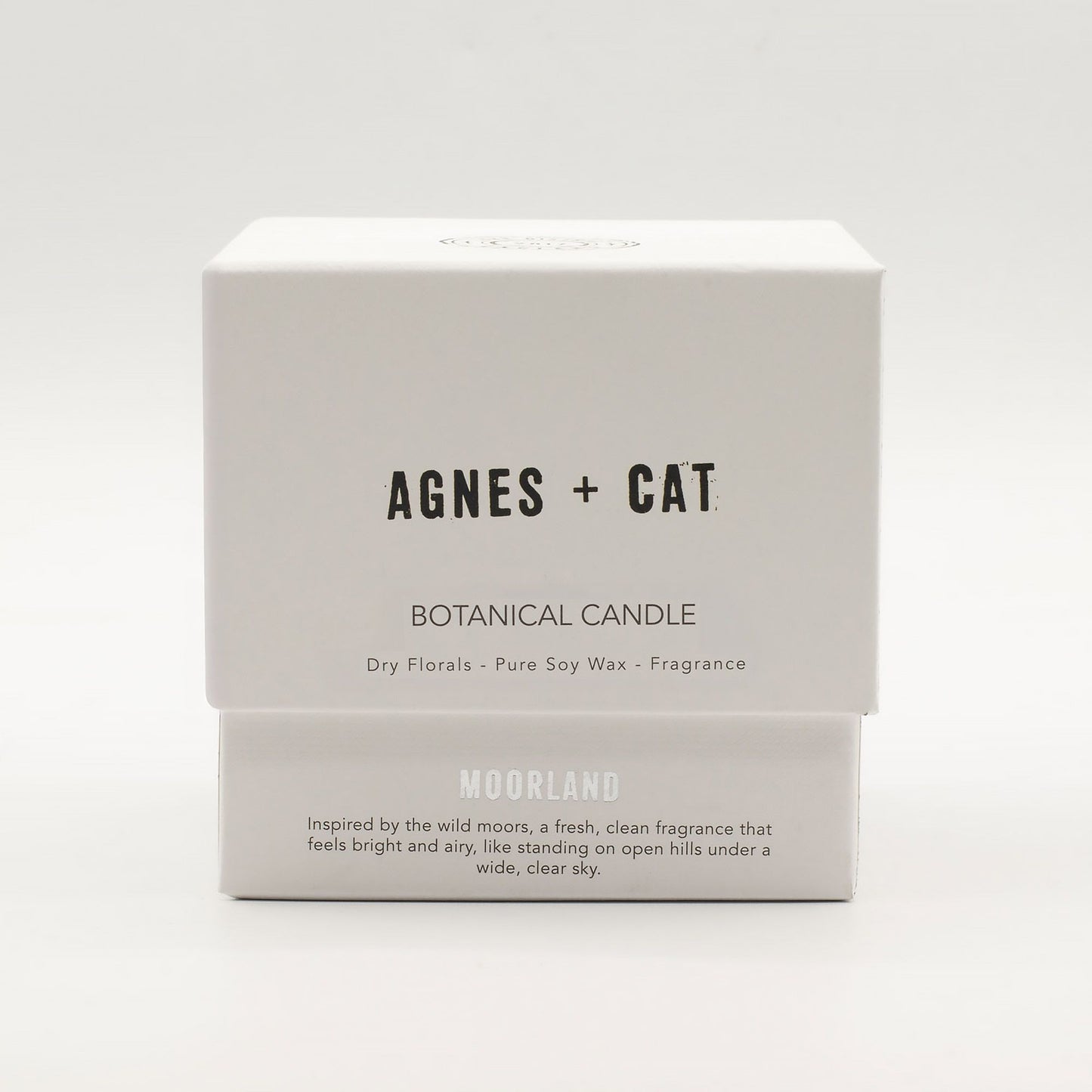 Detailed close up view highlighting the high quality craftsmanship and individual features of the agnes cat botanical soy wax candle moorland506