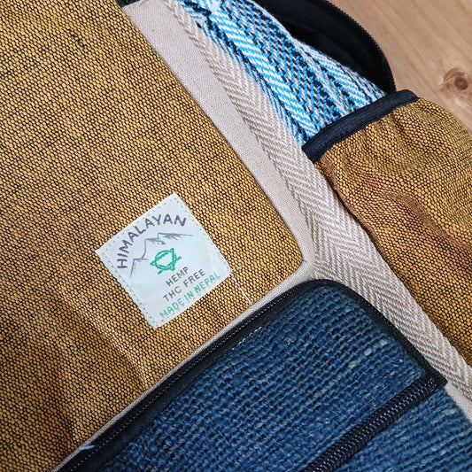 Large Boxy Hemp Backpack - Teal & Tumeric lifestyle product photo on neutral background