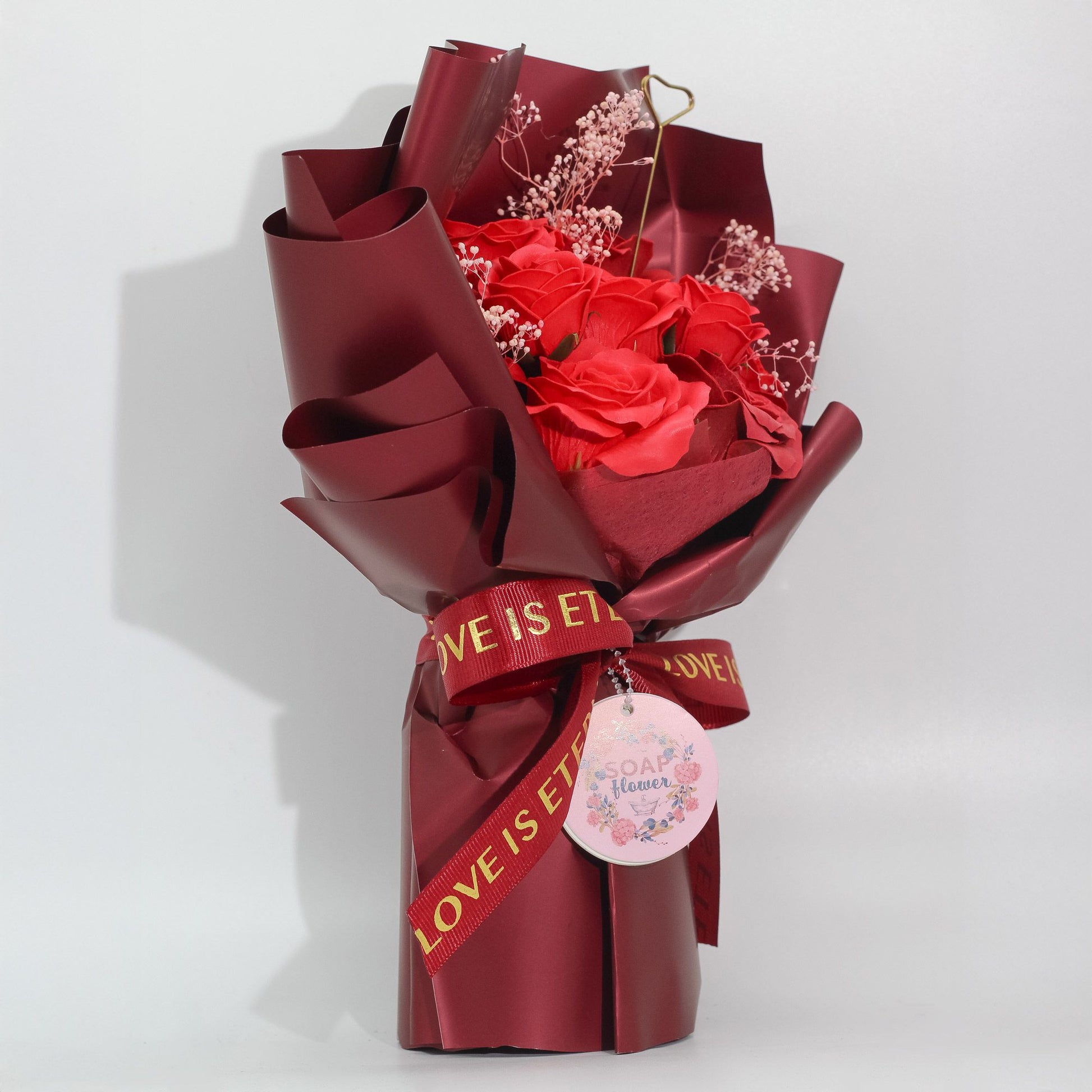 Detailed close up view highlighting the high quality craftsmanship and individual features of the large red roses bouquet love is eternal gift card826