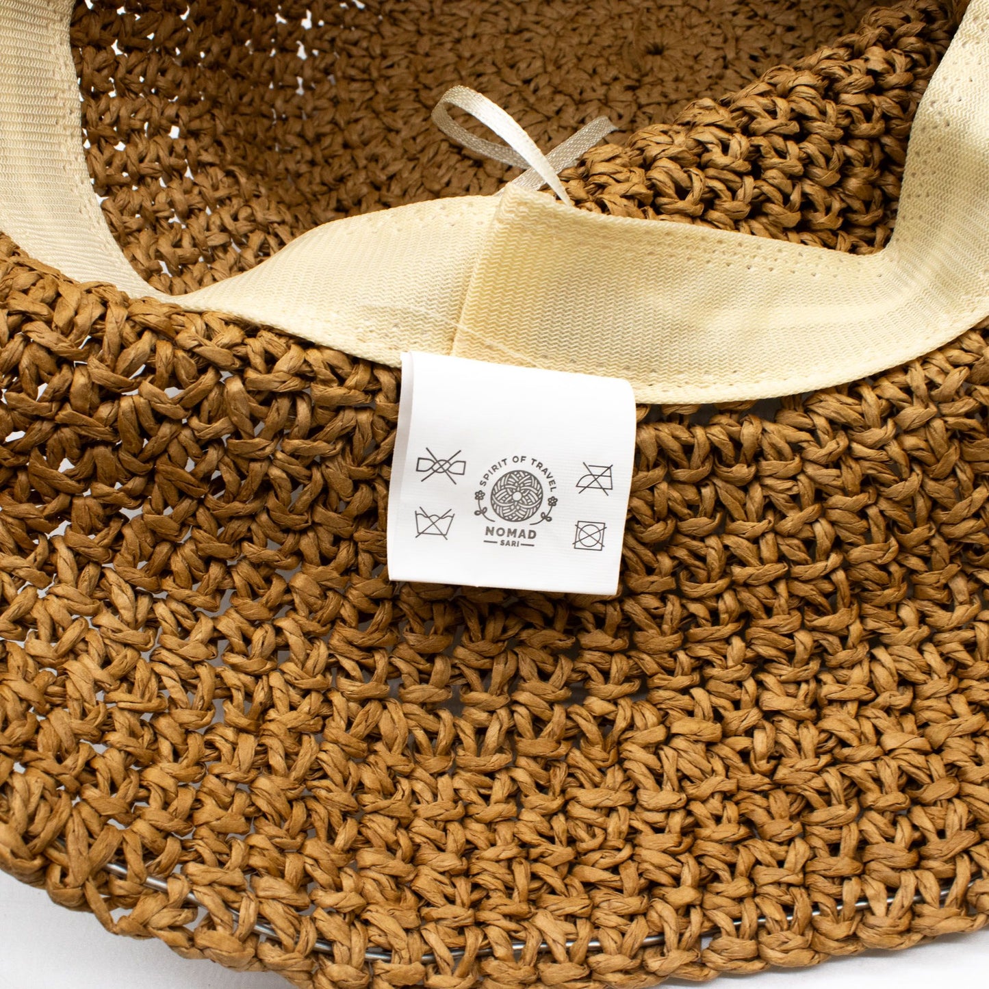 Photo 1 of Nomad Sari Floppy Straw Sun Hat - Natural Coffee Sun Beac... featuring authentic premium craftsmanship.