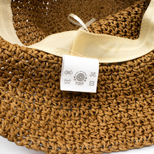 Photo 1 of Nomad Sari Floppy Straw Sun Hat - Natural Coffee Sun Beac... featuring authentic premium craftsmanship.