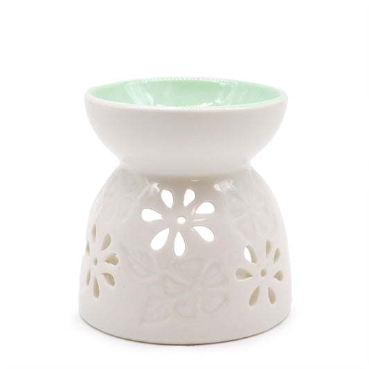 Classic White Oil Burner - Floral with Teal Well lifestyle product photo on neutral background