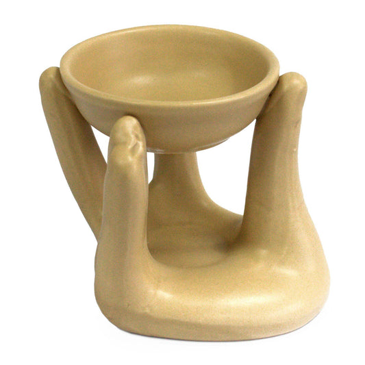 Open Hands Oil Burner - Tan lifestyle product photo on neutral background