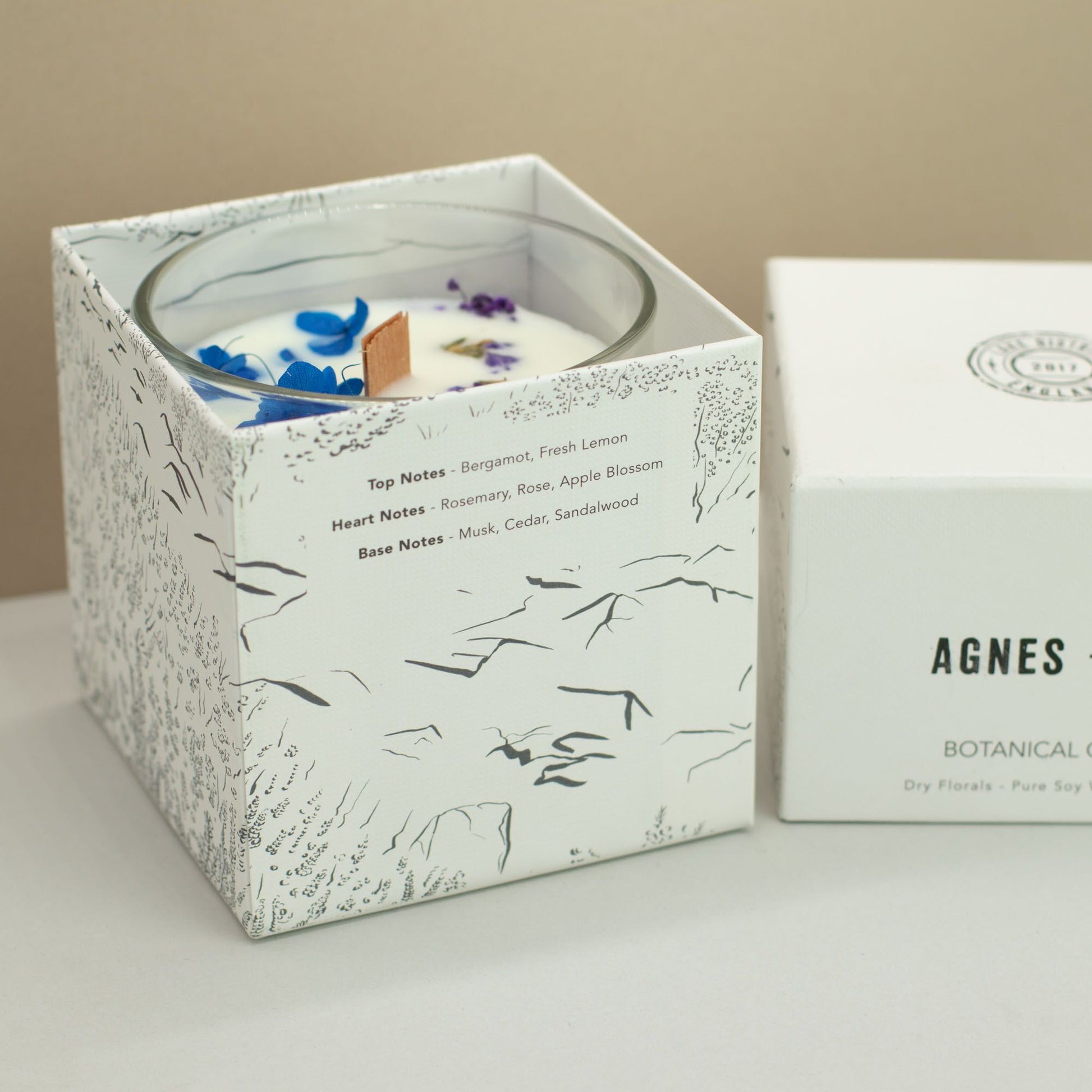 Detailed close up view highlighting the high quality craftsmanship and individual features of the agnes cat botanical soy wax candle moorland506