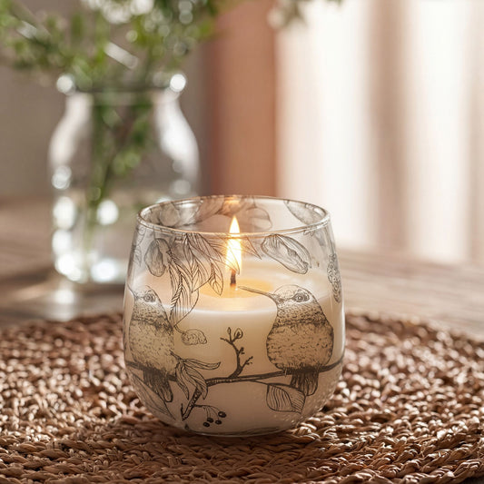 Detailed close up view highlighting the high quality craftsmanship and individual features of the medium glass jar candles drawn by flame385