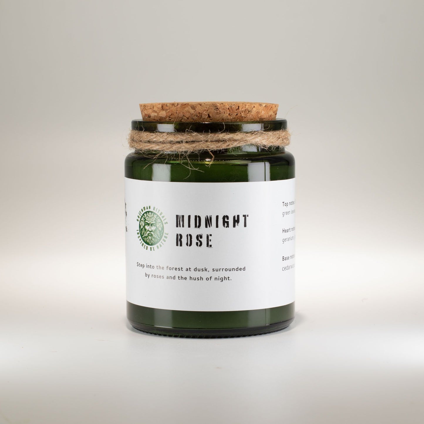 Detailed close up view highlighting the high quality craftsmanship and individual features of the greenman woodwick soy candle midnight rose413