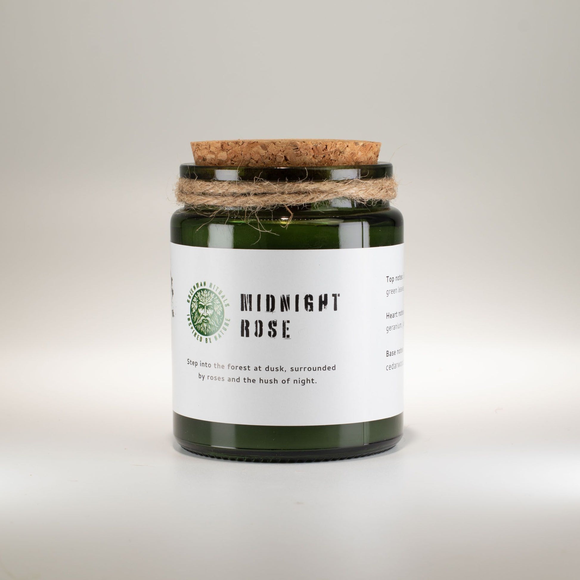 Detailed close up view highlighting the high quality craftsmanship and individual features of the greenman woodwick soy candle midnight rose413