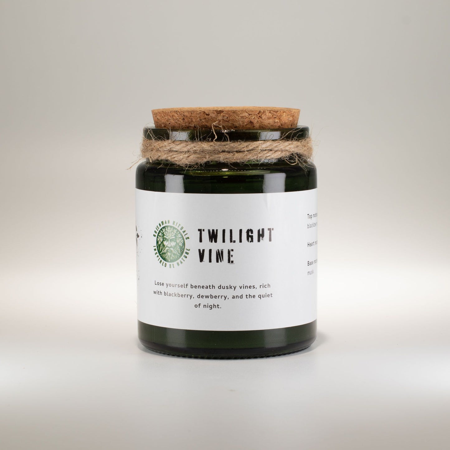 Detailed close up view highlighting the high quality craftsmanship and individual features of the greenman woodwick soy candle twilight vine565