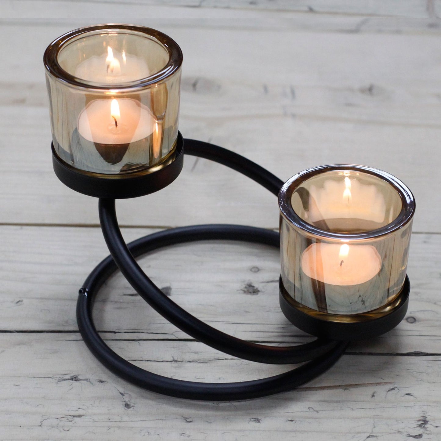 Detailed close up view highlighting the high quality craftsmanship and individual features of the centrepiece iron votive candle holder 2 cup double step401