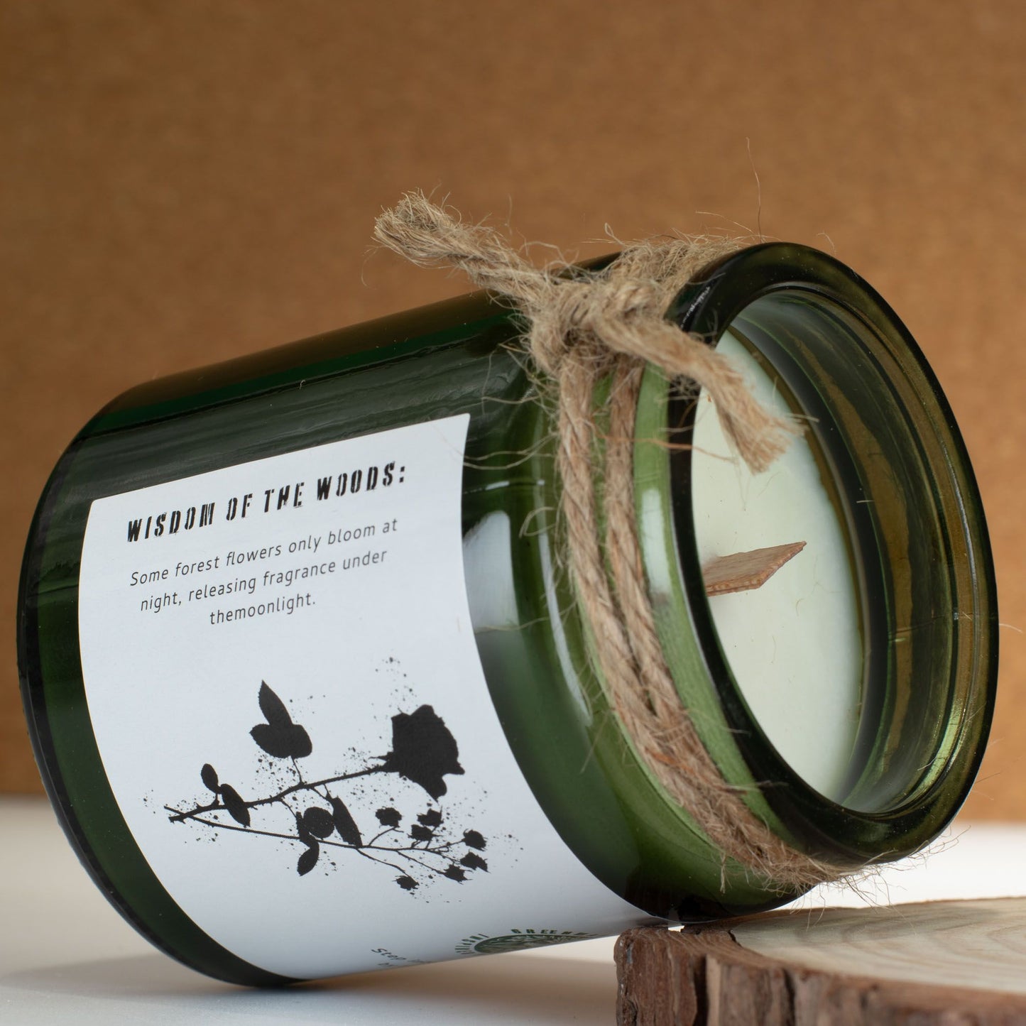 Detailed close up view highlighting the high quality craftsmanship and individual features of the greenman woodwick soy candle midnight rose413